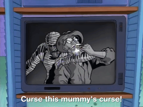 Meme gif animado maldigo esta maldición de la momia caricatura televisión película cartoon hombre siendo capturado por momia que usa una llave 